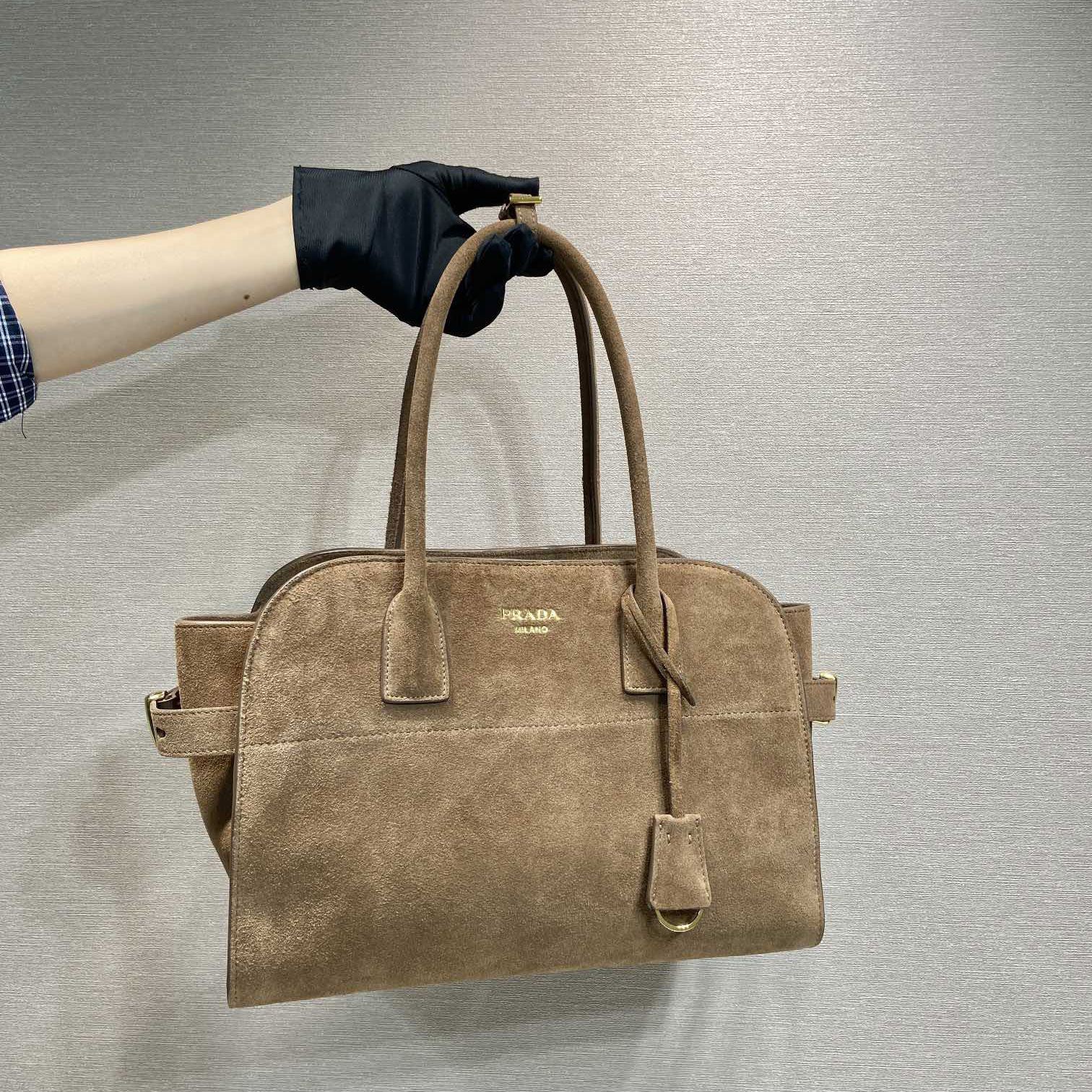 Pra*a top handle bags